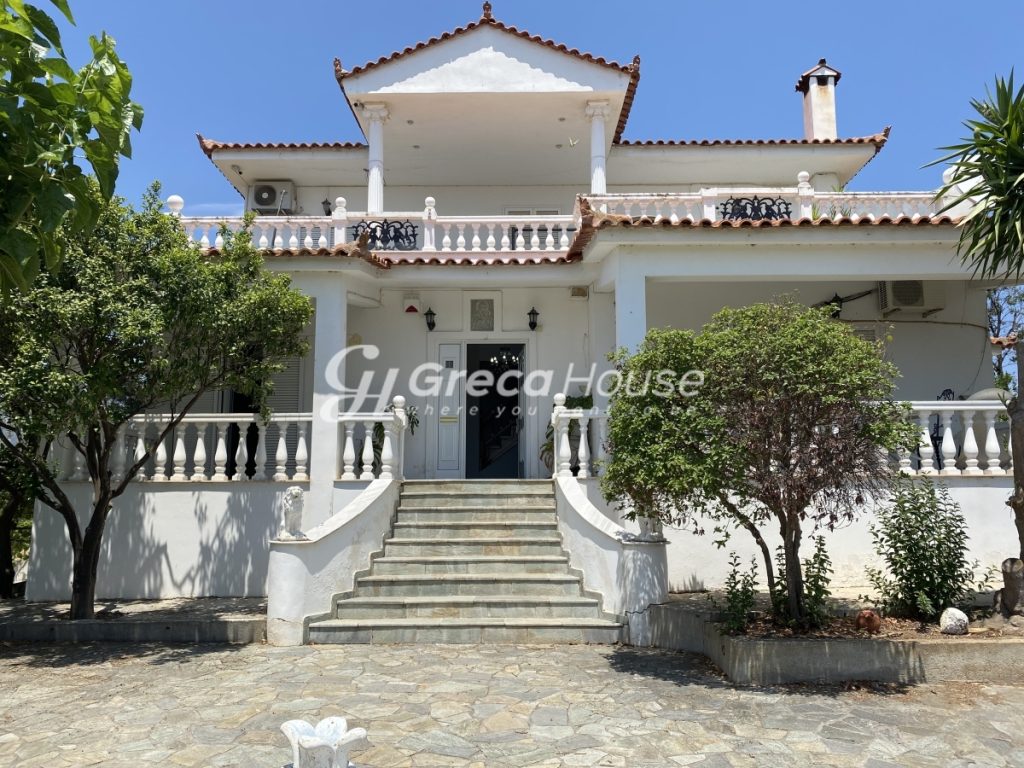 buy house in greece